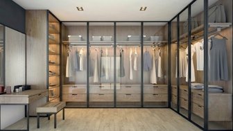 Modern glass wardrobe design in Faridabad for a contemporary bedroom