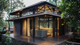 Modern glass house design in Faridabad with glass walls and aluminium framing