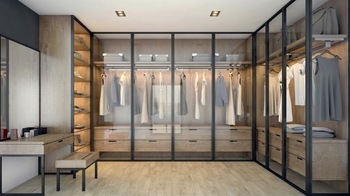 Modern glass wardrobe design in Faridabad for a contemporary bedroom